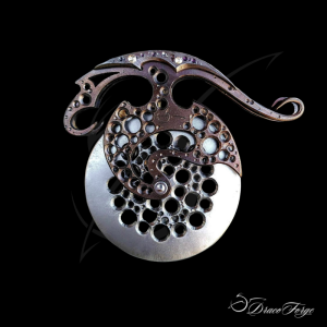 Roulette à pizza 6 artisanale design ajourée inox Dracoforge