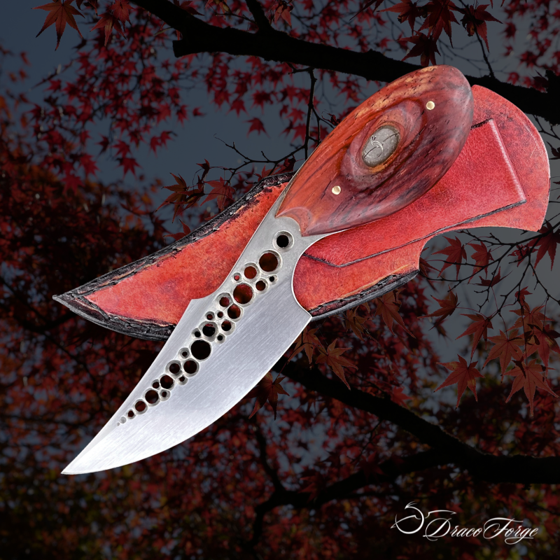 Dent de Lune 13 couteau outil artisanal compact polyvalent inox ajourages circulaires manche cocobolo Dracoforge Dent de Lune 13 couteau outil artisanal compact polyvalent inox avec ajourages circulaires manche cocobolo et étui cuir Dracoforge