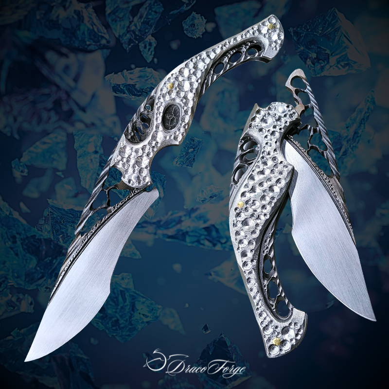 Neptune 60 couteau pliant artisanal argenté tout inox ajourage dentelle d'acier Dracoforge Neptune 60 couteau pliant artisanal argenté tout inox ajourage dentelle d'acier Dracoforge